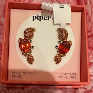 Piper K Gold-tone Crab Stud Earrings with Red-Orange Crystals